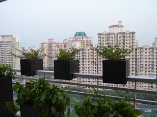 Apartment at Icon, DLF5, Gurgaon, Grecor Grecor Rustic style balcony, veranda & terrace