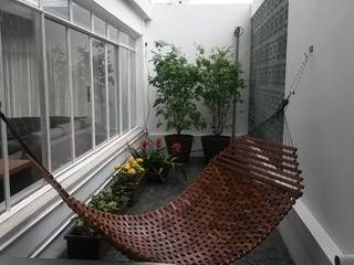 homify Tropical style balcony, veranda & terrace Green