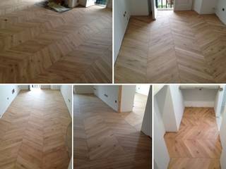 Posa in opera a spina francese di parquet massello in quercia, Soloparquet Srl Soloparquet Srl غرفة المعيشة خشب نقي Multicolored