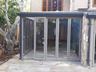 Built in Wooden Sliding Doors, Slab Cast And Tiled Patio, Aluminium And Glass Conservatory, Exterior House Painted, Aggregate Driveway Layed., CPT Painters / Painting Contractors in Cape Town CPT Painters / Painting Contractors in Cape Town