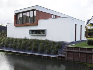 Moderne woning, Krakestee Oud-Beijerland, Thijssen Verheijden Architecture & Management Thijssen Verheijden Architecture & Management Villa Hout Wit