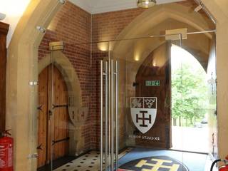 Double arched glass doors at Cranleigh School, Ion Glass Ion Glass Espacios comerciales Vidrio