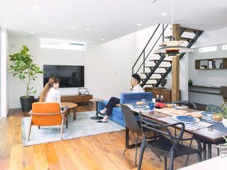 T House , 85inc. 85inc. Living roomSofas & armchairs جلد Orange