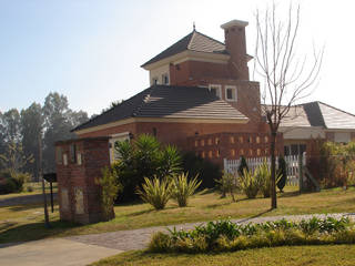 Casa BN, Estudio D3B Arquitectos Estudio D3B Arquitectos Log cabin Bricks