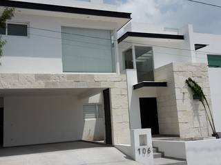 CASA-JR, RIVERA ARQUITECTOS RIVERA ARQUITECTOS Single family home Stone