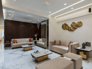 Interior in Mumbai Suburb, Tanuja and Associates Tanuja and Associates モダンデザインの リビング