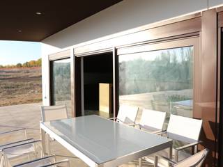 Vivienda Guadiana Golf, DonStudio DonStudio Balcones y terrazas de estilo moderno