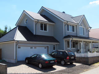 Neubau eine Einfamilienhauses im Amerikanischen Stil, STRICK Architekten + Ingenieure STRICK Architekten + Ingenieure Houses