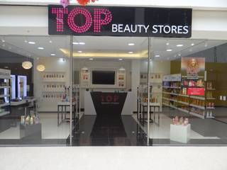 LOCAL COMERCIAL TOP BEAUTY STORES, Area Arquitectura Sas Area Arquitectura Sas モダンデザインの リビング ガラス