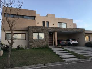 VIVIENDA EG, BVS+GN ARQUITECTURA BVS+GN ARQUITECTURA Casas familiares Pedra