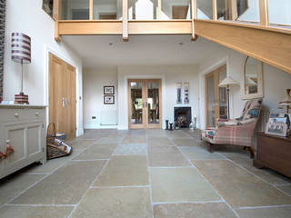 A Beautiful Entrance: Umbrian Limestone, Quorn Stone Quorn Stone Rustic style corridor, hallway & stairs Limestone
