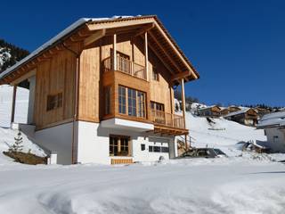 Una casa da montagna in Trentino, Woodbau Srl Woodbau Srl Casa prefabbricata Legno