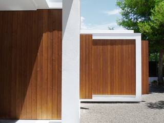 MAISON ELIANA, CALMM ARCHITECTURE CALMM ARCHITECTURE Houses لکڑی White
