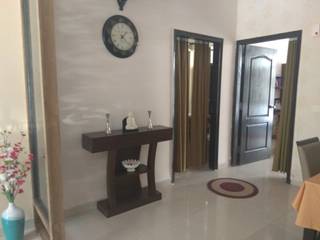 Villa in New Chandigarh, Kapilaz Space Planners & Interior Designer Kapilaz Space Planners & Interior Designer Living room Engineered Wood Beige