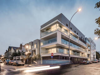 Apartment building Jean Jaures, OGGOstudioarchitects, unipessoal lda OGGOstudioarchitects, unipessoal lda Nhà phong cách tối giản