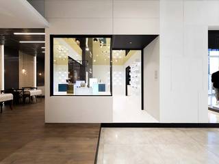KRION SHOWROOM / Optician - Restaurant, KRION® Porcelanosa Solid Surface KRION® Porcelanosa Solid Surface Commercial spaces