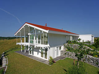 Architektenvilla in Osterseen, DAVINCI HAUS GmbH & Co. KG DAVINCI HAUS GmbH & Co. KG Modern home