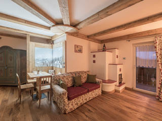 Lo stile chalet secondo Ri-novo, RI-NOVO RI-NOVO Rustic style living room Wood Wood effect