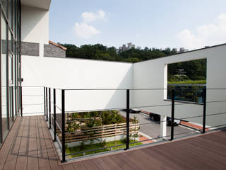 HOUSE DAM, 디자인그룹 콜라보 디자인그룹 콜라보 Casas modernas