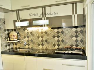 3bhk Home at Godrej Horizon, Kriti Associates / girishsdesigns Kriti Associates / girishsdesigns Minimalist kitchen Plywood