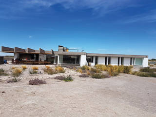 CASA DE LA PIEDRA CHIU-CHIU, II REGIÓN DE ANTOFAGASTA, RH+ ARQUITECTOS RH+ ARQUITECTOS บ้านและที่อยู่อาศัย คอนกรีต