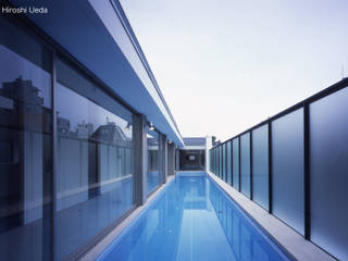 東京でプールのある家, 石川淳建築設計事務所 石川淳建築設計事務所 Minimalistische Pools Beton Weiß