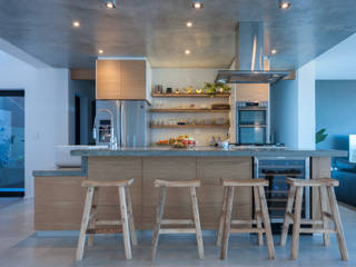Oak kitchen with concrete tops JBA Architects Kitchen units Wood Wood effect concrete tops,oak cupboards,cement floor
