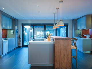 Kitchen with wooden bar counter JBA Architects Kitchen units Wood Wood effect kitchen island,black tiles,grey