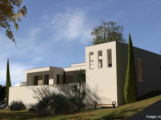 Une villa moderne construite à flanc de colline, Atoutplans Architecture Atoutplans Architecture モダンな 家