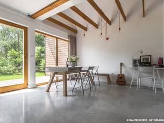 Simple House, Bautech Sp. Z O.O. Bautech Sp. Z O.O. Modern living room Concrete Grey