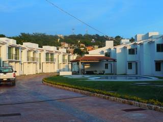 Maravilloso Residencial - El Palmar, DYE-ARQUITECTURA DYE-ARQUITECTURA Casas multifamiliares