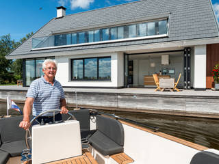Nah am Wasser gebaut, Solarlux GmbH Solarlux GmbH Skandinavischer Balkon, Veranda & Terrasse