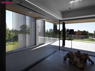 Volumi contemporanei, Modula Group Srl Modula Group Srl 모던스타일 다이닝 룸 알루미늄 / 아연