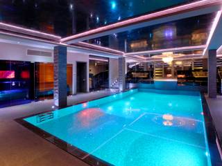 Pool at night time - steam and sauna Design by UBER Kolam Renang Modern night pool,pool,indoor pool,steam room,sauna