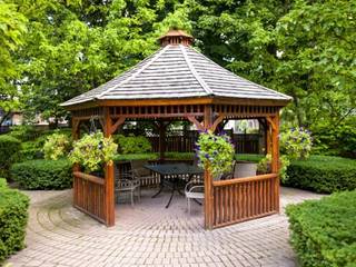 TOMRUK KAMELYA, Tomruk yapı & mimarlık Tomruk yapı & mimarlık Classic style garden Wood Wood effect