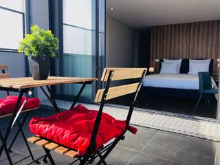 Live In Porto Apartamentos , Equevo - Interiores Design Equevo - Interiores Design Balcones y terrazas modernos