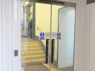 Fire rated glass doors in heritage building , Ion Glass Ion Glass مساحات تجارية زجاج