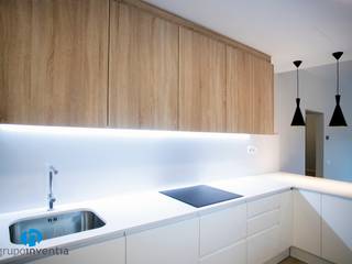 Reforma integral en Vallirana, Grupo Inventia Grupo Inventia Built-in kitchens Wood-Plastic Composite