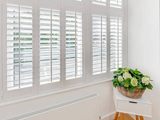 Beautiful Tier on Tier Shutters at a home in the Heart of Crystal Palace, Plantation Shutters Ltd Plantation Shutters Ltd Modern style bedroom Wood Wood effect