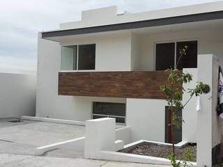 CASA-DYG, RIVERA ARQUITECTOS RIVERA ARQUITECTOS Casas unifamiliares Cerámico