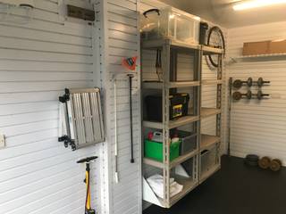 Give your bike pride of place in this tidy and organised garage, Garageflex Garageflex Garage/shed