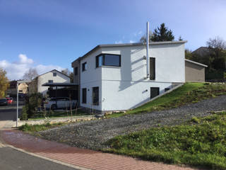 Einfamilienhaus am Hang, wir leben haus - Bauunternehmen in Bayern wir leben haus - Bauunternehmen in Bayern Cabañas