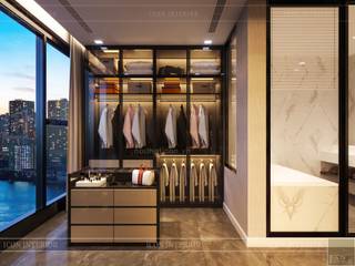 Thiết kế nội thất hiện đại tinh tế ở căn hộ Vinhomes Central Park, ICON INTERIOR ICON INTERIOR Moderne Ankleidezimmer