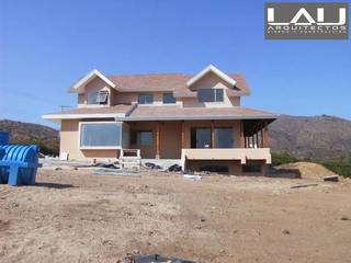 Casa Tabolango, Lau Arquitectos Lau Arquitectos コロニアルな 家