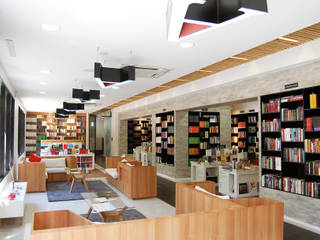 FCE: Librería Gonzalo Rojas + Oficinas, Estudio Mínimo Arquitectura y Construcción Ltda. Estudio Mínimo Arquitectura y Construcción Ltda. Commercial spaces