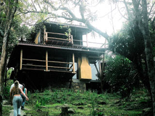 Residência Ibiraquera, Raiz Arquitetônica Raiz Arquitetônica Chalets & maisons en bois