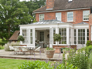 Elegant Georgian orangery with separate side entrance adjoining the home., Vale Garden Houses Vale Garden Houses بيت زجاجي خشب Wood effect