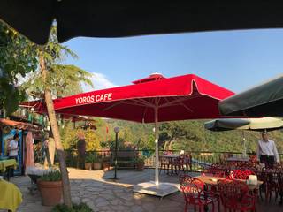 YOROS & KALE CAFE ŞEMSİYELERİ, Akaydın şemsiye Akaydın şemsiye Modern terrace Aluminium/Zinc Red