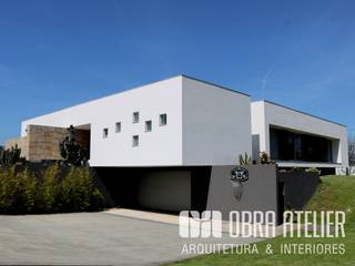 Projeto de casa moderna chave na mão, OBRA ATELIER - Arquitetura & Interiores OBRA ATELIER - Arquitetura & Interiores 別墅