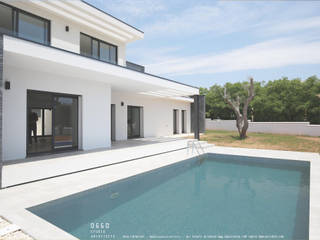 House with a pool in Algarve, OGGOstudioarchitects, unipessoal lda OGGOstudioarchitects, unipessoal lda Minimalist houses